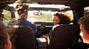 Family in car going for a trip